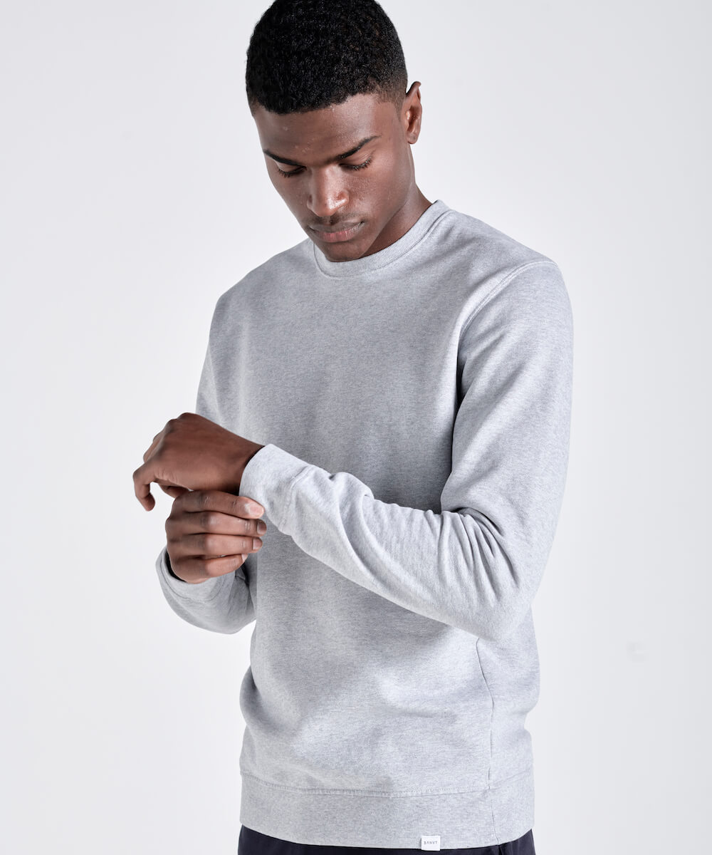 Man wearing a high quality, sustainable sweater.